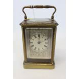 French Aiguilles brass carriage clock with later engraved dial