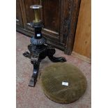 A late Victorian ebonised wood revolving piano stool with screw action, incised decoration and