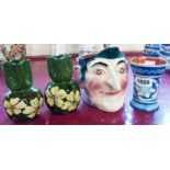 Four pieces of Torquay pottery including a pair of vases