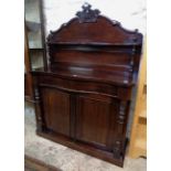 A 3' 5" Victorian mahogany serpentine front chiffonier with flanking turned supports to raised back,