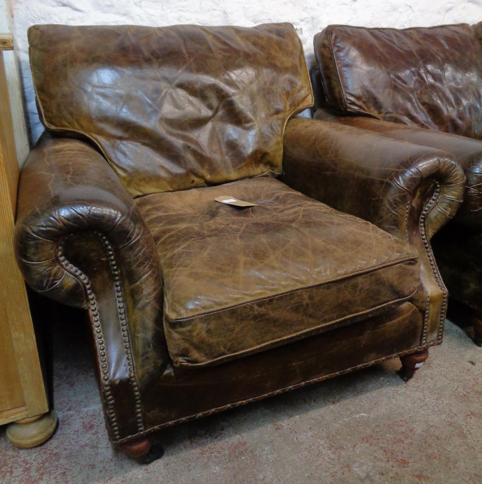 A 5' 8" studded brown leather upholstered two seater settee and armchair to match - the settee - Image 2 of 2