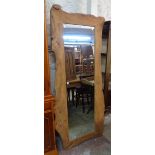 A rustic hardwood framed full length mirror - 5' 10 1/2" X 30" overall