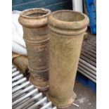 Two antique terracotta chimney pots, one 34 1/2", the other 36" (base a/f)