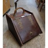 A Victorian walnut slope fronted coal box with coppered and pressed metal hinges, shovel and liner -