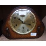 A mid 20th Century polished oak cased mantel clock with GU eight day Westminster chiming movement