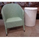 A Lloyd Loom tub chair with pale green finish - sold with a later painted Lloyd Loom linen basket