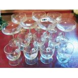 A part of set of seven champagne coupes - sold with a part set of seven custard cups