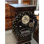 An early 20th Century stained wood cased National Time Recorder Co. Ltd, clocking in clock with
