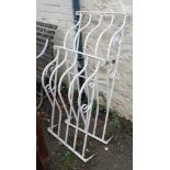 Two similar wall mounted painted wrought iron window railings, one 3' 9 1/4" X 21", the other 35 1/