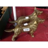 A pair of brass German Shepherd dogs