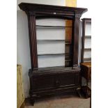 A 4' 9" antique stained mixed wood dresser with moulded dentil cornice, blind fretwork and