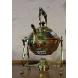 A brass spirit kettle and stand