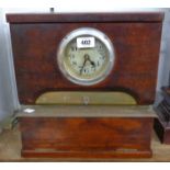 A 13" early 20th Century polished wood cased clocking in clock by The National Time Recorder Co.,
