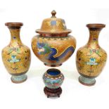 A cloisonné lidded jar with air dragon in cloud shaped cloisons on yellow ground - sold with a