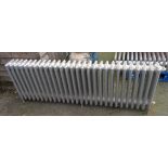 A 5' 10" antique cast iron four column radiator