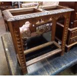 A small carved oak stick stand with applied brass handle - drip-tray missing