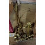 A pair of brass andirons - sold with a companion set