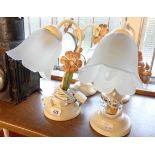 A set of four powder-painted flower pattern table lamps