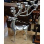 A cast aluminium eight branch candelabrum in the form of a stag