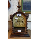 A late 19th Century American shelf clock with spring driven gong striking movement - finials