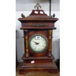 A reproduction American style shelf clock with battery movement