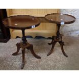 A pair of 18 1/2" reproduction mixed wood oval tray topped pedestal wine tables - sold with an older