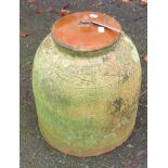 A terracotta rhubarb forcer with lid