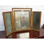 A 20th Century gilt framed triple dressing table mirror