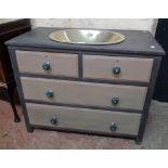 A 34" later painted washstand with hammered metal oval insert to top, dummy drawer fronts and two