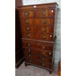 A 29 3/4" 20th Century Jaycee flame mahogany chest in the style of a Georgian chest on chest with