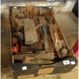 A box containing a quantity of vintage carpenter's planes - various condition