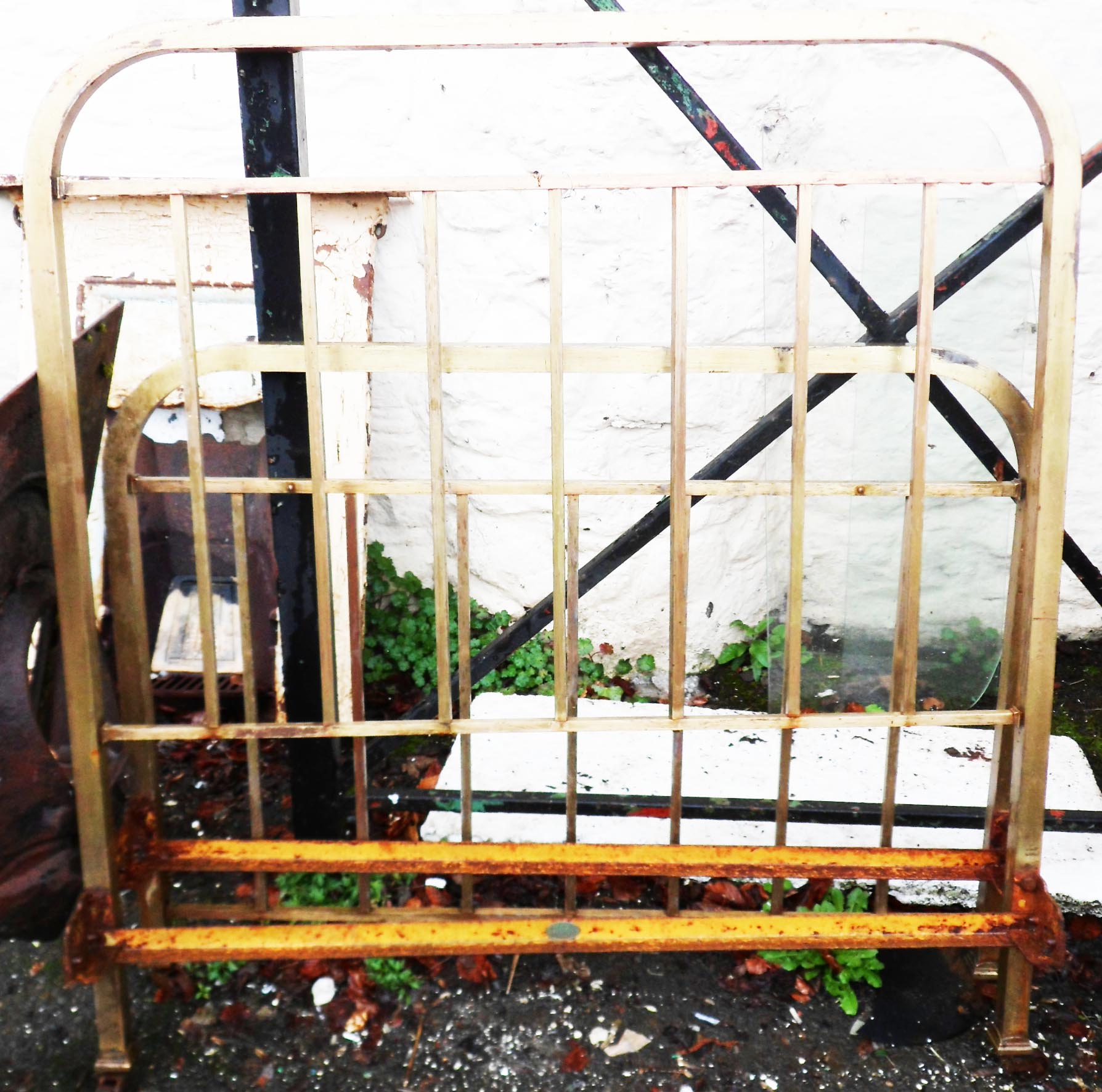 A brass single bedstead