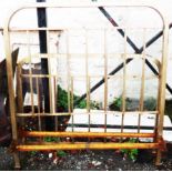 A brass single bedstead