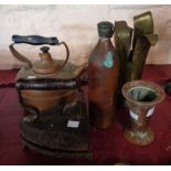 A copper kettle, hot water bottle and vase - sold with a Trench Art shellcase vase and a flat iron
