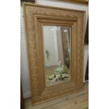 An old gilt framed bevelled oblong wall mirror with remains of painted swan decoration to plate