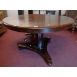 A 3' 11" diameter 19th Century mahogany breakfast table, set on faceted tapered pillar and trefoil