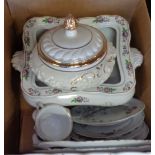 A box containing a quantity of ceramics including lidded pedestal bowl, decorative plates, tureen (