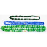 A malachite bead necklace - sold with two glass bead necklaces