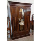 An Edwardian mahogany cross banded and strung part bedroom suite, comprising a 4' 1 1/2" wardrobe