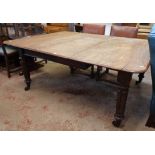 A 6' 1 1/2" William IV mahogany extending drawer frame dining table with central leaf, set on