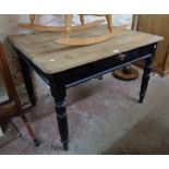 A 3' 8" Victorian pine scrub-top kitchen table, set on ebonised base with single drawer and turned