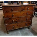 A 3' 5" Victorian stained pine chest of two short and three long graduated drawers, set on raised