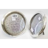 A pair of 6 1/2" diameter silver fronted photograph frames with oak easel backs - Birmingham 1919