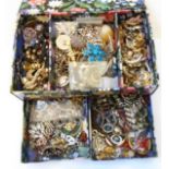 A printed card jewellery box with costume jewellery contents