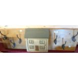 A set of coat hooks with key cottage