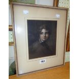 A framed early 19th Century pastel portrait of a young man