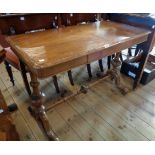 A 3' 6" 19th Century mahogany side table with moulded top and blind frieze drawer, set on turned