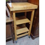 A 20" Oasis Island modern polished wood Butcher's block/preparation station with folding base and