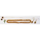 A hallmarked 375 gold rope twist chain, an emerald set cross on marked 375 chain and two pairs of