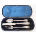 A cased Victorian silver knife, fork and spoon set - Birmingham 1871
